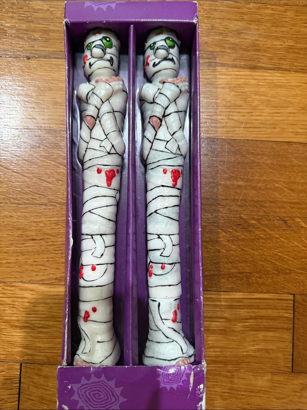 Russ Berrie White Mummy Taper Candle Pair with Red and Green Accents